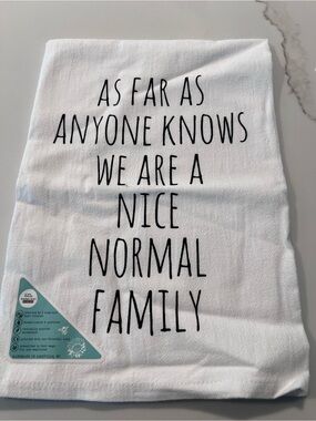 White Kitchen Towel with Black Lettering "Nice Normal Family"
